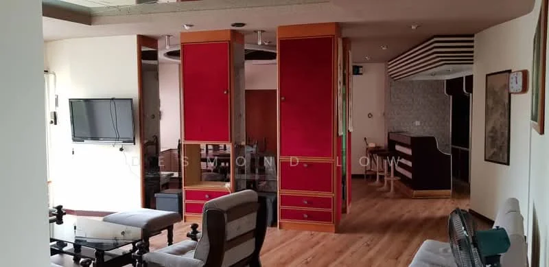 Room features: wooden flooring, red cabinetry with gold trim, wall-mounted TV, open layout, recessed lighting, decorative wall paneling, bar area with counter, ceiling with decorative elements, multiple seating areas, large windows, fan, neutral wall color; style: modern.