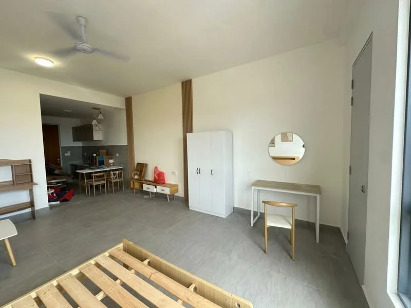 Room features: grey tile flooring, white painted walls, wooden accent wall, ceiling fan, round mirror, white wardrobe, wooden study desk, wooden chair, dining table with chairs, open layout, natural light from windows; style: modern.