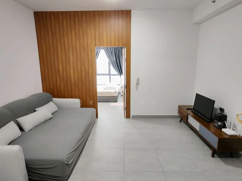 Living features: grey fabric sofa, wooden accent wall, white painted walls, tile flooring, TV console, wall-mounted TV, window with sheer curtains, light fixture, decorative items on console; style: modern. Room features: bed visible through doorway, grey bedding, window with curtains.