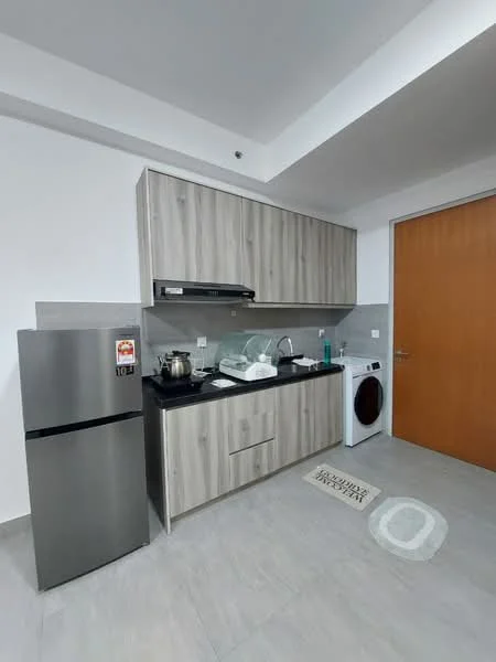 Kitchen features: grey laminate cabinetry, black granite countertop, stainless-steel fridge, built-in stove with hood, single-bowl stainless-steel sink, chrome pull-down faucet, white washing machine, grey tile backsplash, light grey tile flooring, kitchen mat, wall-mounted cabinets; style: modern.