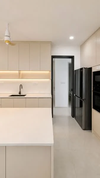 Kitchen features: light beige cabinetry, white quartz countertop, single-bowl black sink, black gooseneck faucet, built-in black refrigerator, built-in black oven, recessed lighting, pendant light fixture, ceramic tile flooring, open layout, island with seating area; style: modern.