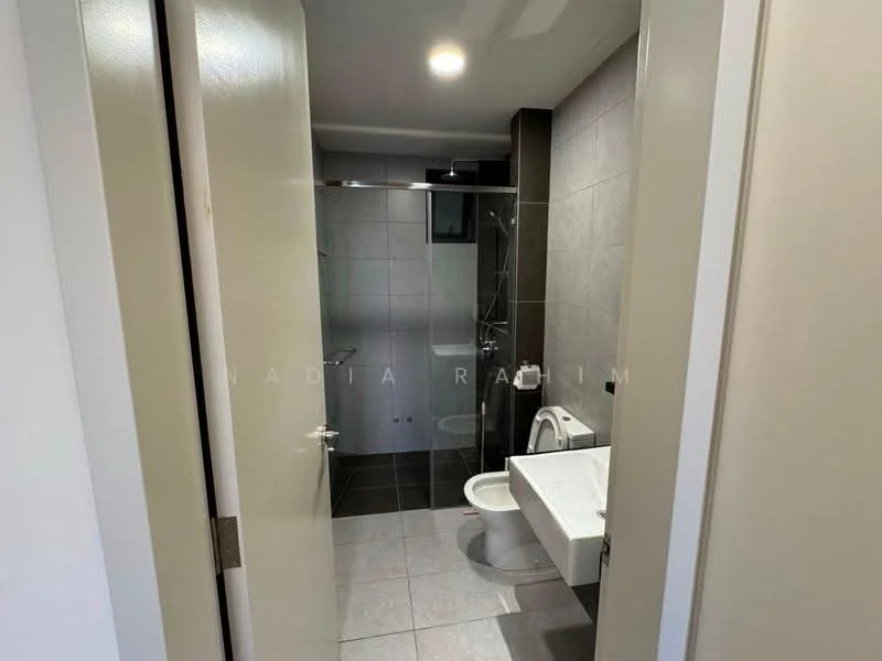 Bathroom features: grey tile flooring, white tiled walls, glass shower enclosure, rain shower head, handheld shower, single-sink vanity with white cabinet, chrome basin mixer, one-piece toilet, mirror above vanity, recessed downlights; style: modern.