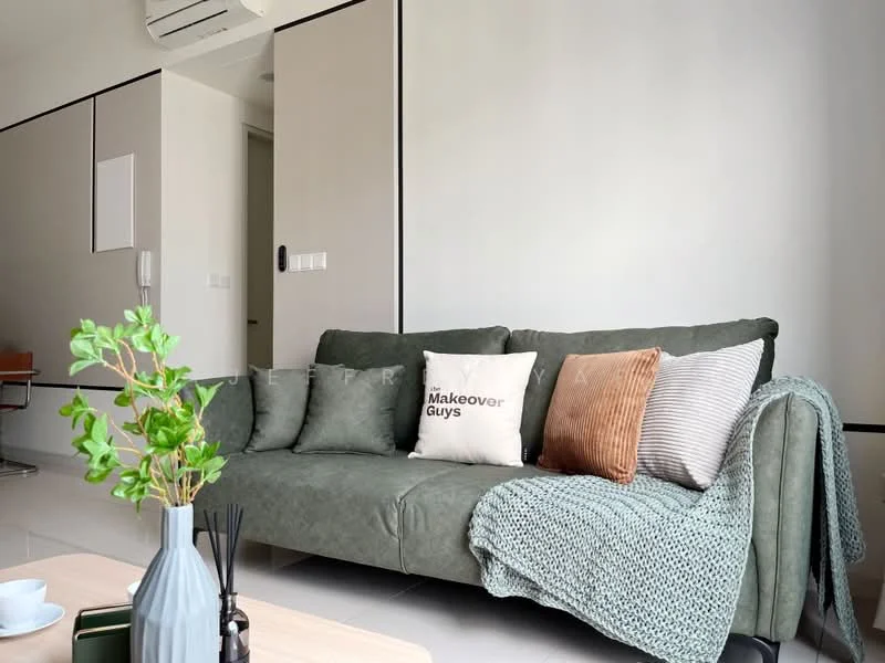 Living features: green fabric sofa, decorative cushions in various colors, knitted throw blanket, coffee table, wall-mounted air conditioning unit, white painted walls, glossy tile flooring, floor-to-ceiling window, indoor plant in vase; style: modern.