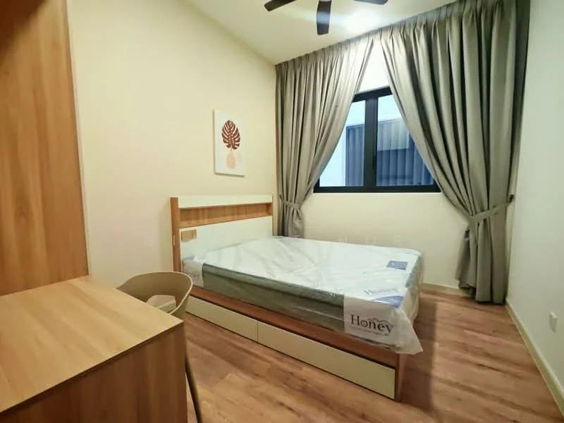 Bedroom features: queen-size bed, wooden bed frame, light wood bedside table, study desk, chair, floor-to-ceiling window, grey curtains, wooden flooring, decorative wall art with leaf design, white painted walls, ceiling fan; style: modern.