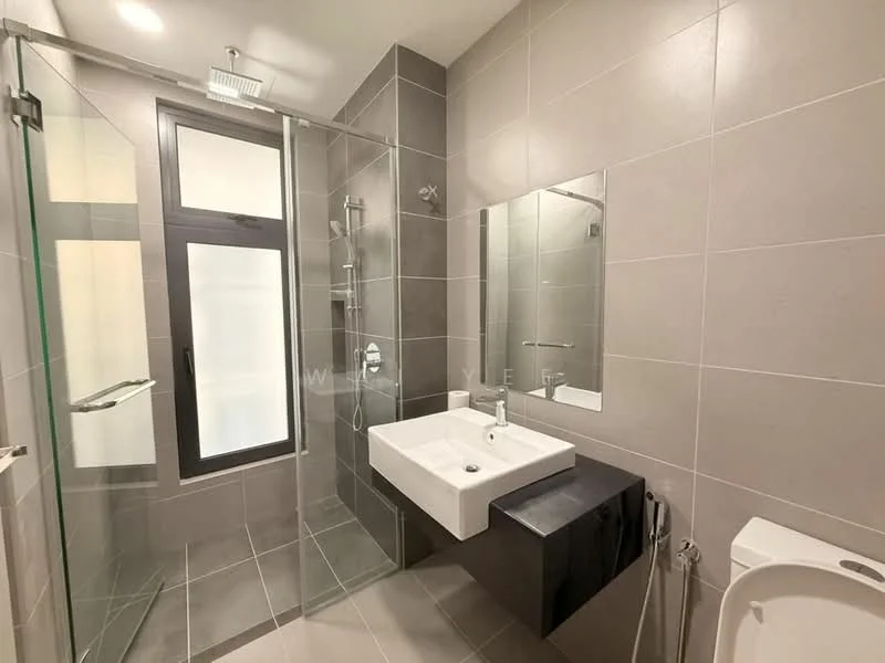 Bathroom features: grey tiled walls, light grey floor tiles, walk-in shower with glass enclosure, rain shower head, handheld shower, single-sink vanity with black cabinet, white rectangular sink, chrome basin mixer faucet, framed mirror, one-piece toilet, wall-mounted toilet paper holder, glass shower panel; style: modern.