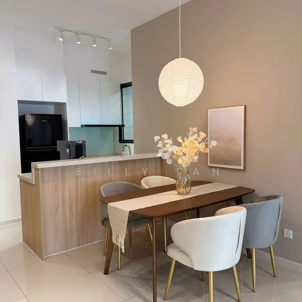 Dining features: round dining table with wooden top, 4 upholstered dining chairs in light grey, pendant lamp with round paper shade, decorative vase with flowers, cream painted walls, white cabinetry, grey countertop, stainless-steel fridge visible in background, open kitchen layout, recessed ceiling lights; style: modern. Kitchen features: white upper cabinets, grey lower cabinets, black appliances, granite countertop, sink with faucet, open shelving; style: modern.