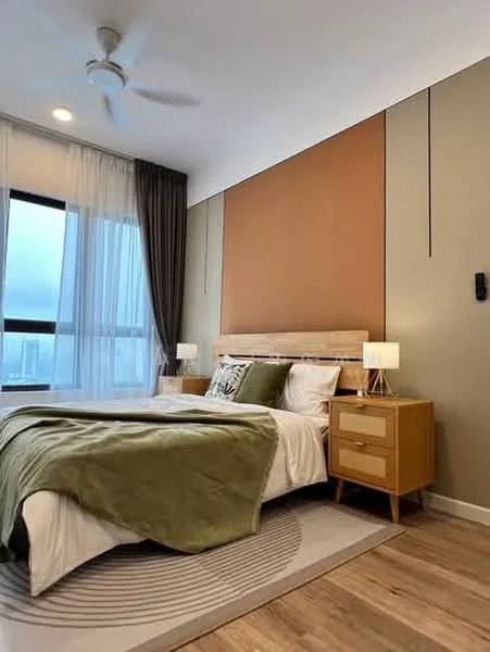 Bedroom features: king-size bed with wooden headboard, green throw blanket, two bedside lamps with white shades, wooden nightstands, area rug with circular pattern, floor-to-ceiling window with sheer curtains, brown accent wall, cream painted walls, ceiling fan, wooden flooring; style: modern; view: city.