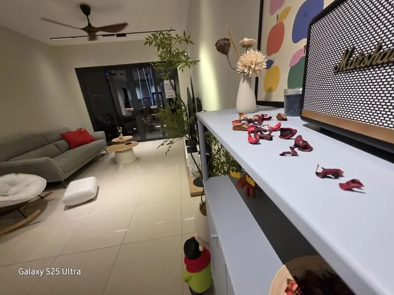 Living features: grey fabric sofa, white round coffee table, floor-to-ceiling windows, sliding glass door, ceiling fan, decorative plants, decorative vase with flowers, shelving unit, wooden floor, area rug, wall art with colorful patterns, rose petals scattered on the table; style: modern; view: garden.
