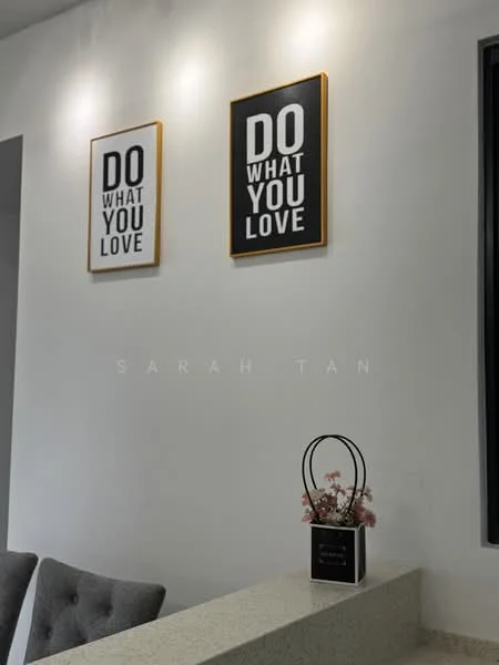 Room features: white painted walls, grey upholstered sofa, decorative wall art with black frames, granite countertop, small decorative plant in a pot; style: modern.