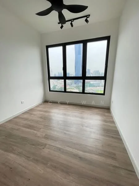 Room features: large floor-to-ceiling windows, city skyline view, light wood laminate flooring, white painted walls, black ceiling fan with light, track lighting, neutral color scheme; style: modern; view: city.