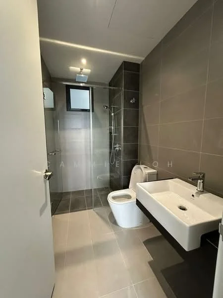 Bathroom features: grey tiled walls, light grey tiled flooring, walk-in shower with glass enclosure, chrome shower head, chrome handheld shower, single-sink vanity with white countertop, wall-mounted faucet, one-piece toilet, mirror above sink, recessed ceiling lights, window for natural light; style: modern.