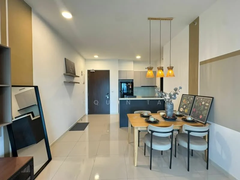 Dining features: dining table with 4 chairs, pendant lighting with 3 bulbs, decorative wall art, mirror leaning against wall, white walls, cream accent wall, tile flooring, kitchen area visible in background, refrigerator visible in kitchen, open layout; style: modern.