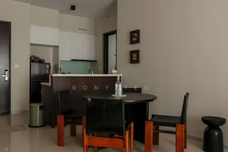Dining features: round dining table, 4 black leather dining chairs, light grey walls, cream tiled flooring, kitchen island with sink, white cabinetry, black refrigerator, green backsplash, decorative wall art, table centerpiece; style: modern. Kitchen features: white cabinetry, kitchen island with sink, black refrigerator, green backsplash; style: modern.