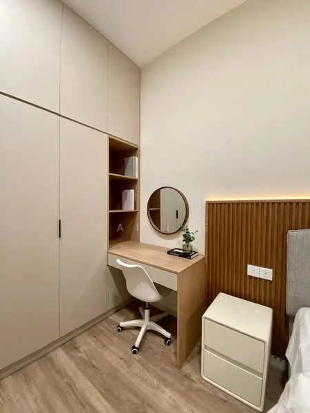 Bedroom features: light wood flooring, cream painted walls, built-in wardrobe with sliding doors, study desk with chair, round mirror, decorative plant on desk, bedside table, wood accent wall behind bed; style: modern.