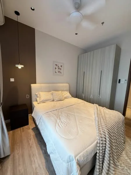 Bedroom features: queen-size bed, upholstered headboard, bedside table, white bedding, throw blanket, wooden wardrobe, pendant light, ceiling fan, wood laminate flooring, accent wall in brown, white painted walls, curtains; style: modern.