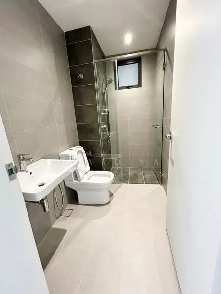 Bathroom features: grey tiled walls, light grey floor tiles, walk-in shower with glass enclosure, rain shower head, handheld shower, single-sink vanity with chrome faucet, one-piece toilet, window for natural light, mirror above sink, modern lighting fixture; style: modern.