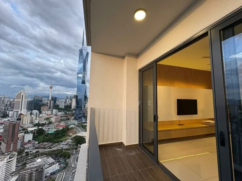 Room features: floor-to-ceiling sliding glass doors, grey tiled flooring, wood paneling on wall, wall-mounted TV, city skyline view, outdoor balcony space, recessed ceiling lights; style: modern; view: city.