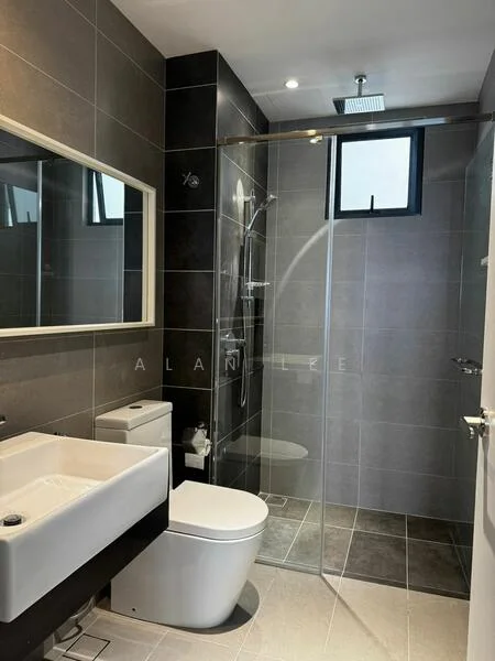 Bathroom features: grey tiled walls, black tiled accent wall, glass shower enclosure, rain shower head, handheld shower, single-sink vanity with white ceramic sink, chrome basin mixer, one-piece toilet, framed mirror, recessed LED downlights, window for natural light, tile flooring; style: modern.