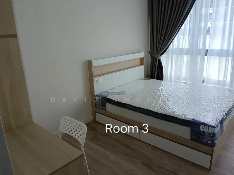 Bedroom features: queen-size bed, wooden bed frame, mattress with plastic cover, study desk with wooden surface, white chair, floor-to-ceiling window, sheer curtains, wooden flooring, light grey walls, built-in wardrobe; style: modern.
