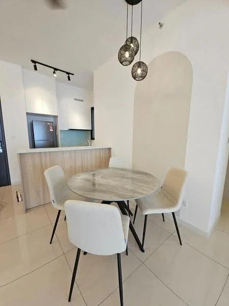 Dining features: round marble dining table, 4 upholstered dining chairs in cream, pendant lighting with three fixtures, white painted walls, glossy tile flooring, kitchen counter visible in background, open layout to kitchen, recessed ceiling lights; style: modern.