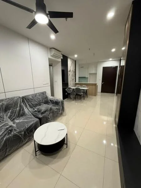 Living features: 3-seater fabric sofa covered in plastic, round coffee table with black base and white top, wall-mounted TV console, recessed ceiling lights, ceiling fan with light, glossy tile flooring, white painted walls, air conditioning unit, open layout to dining area and kitchen; style: modern. Dining features: 4-seater dining table, wooden dining chairs, kitchen counter visible in background, white cabinetry, marble backsplash, open layout to living area; style: modern.