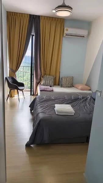 Bedroom features: queen-size bed with grey bedding, single bed with pink pillow, two decorative cushions, floor-to-ceiling window with sheer curtains, curtains in yellow and grey, wall-mounted air conditioning unit, light fixture with a circular design, laminate flooring, accent wall in light blue, chair with modern design; style: modern; view: garden.