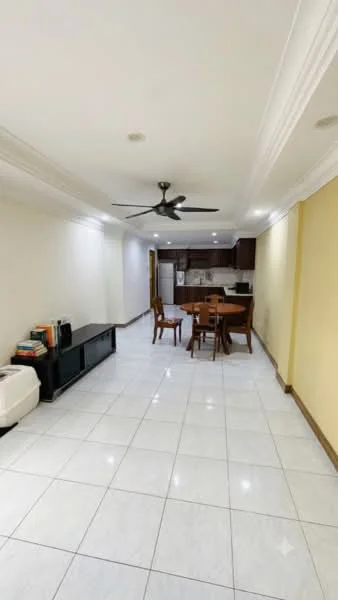Living features: white painted walls, cream accent wall, glossy ceramic tile flooring, 5-blade ceiling fan with light, recessed downlights, dining table with four chairs, TV console, bookshelf, open kitchen area, kitchen cabinetry, stainless-steel appliances; style: modern.