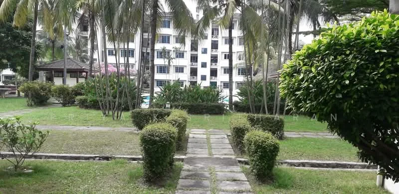 Exterior type: low-rise apartment block; features: manicured lawn, paved walkway, mature palm trees, landscaped garden, bushes, swimming pool visible in background, residential building facade in background, flowering plants; style: modern.