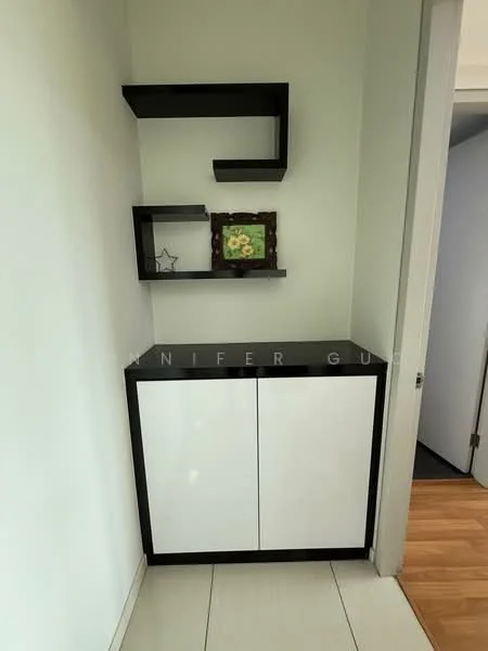 Room features: white cabinet with black handles, black floating shelves, decorative frame on shelf, light wood flooring, white painted walls, tile flooring; style: modern.