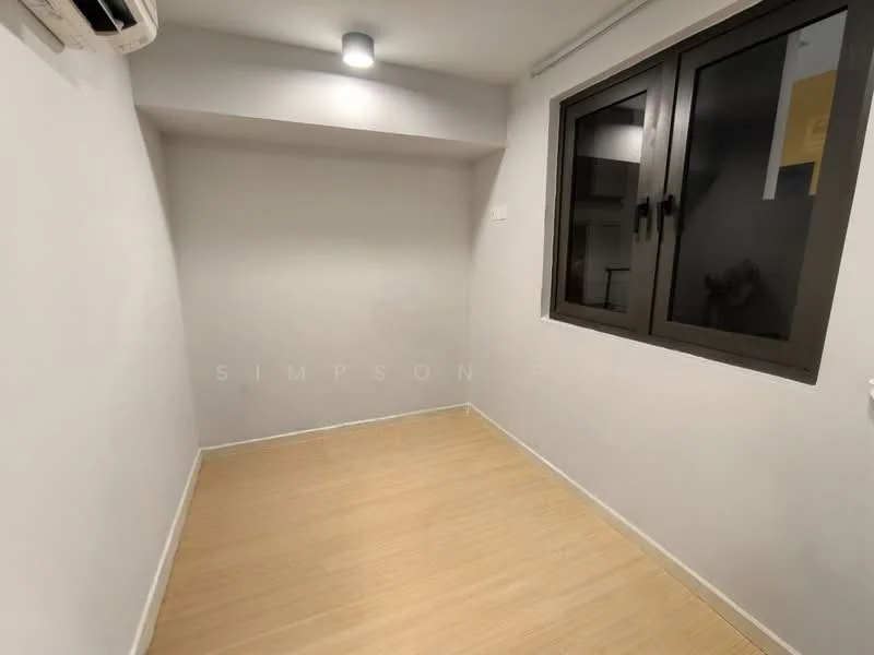 Room features: white painted walls, vinyl plank flooring, 1 wall-mounted split AC, recessed downlight, black framed windows.