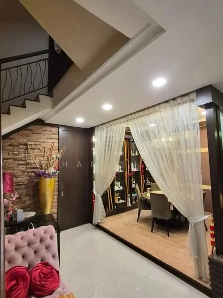 Room features: white walls, cream ceiling, recessed downlights, marble tile flooring, wood paneling, decorative stone wall, sheer curtains, glass display cabinet, upholstered pink armchair, wooden dining chairs, wooden dining table, decorative vase with flowers; style: modern.