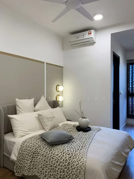 Bedroom features: queen-size bed with upholstered headboard, white bedding with decorative throw, grey throw pillow, 2 bedside lamps, wall-mounted air conditioning unit, ceiling fan, wooden flooring, accent wall with grey paneling, large window with blinds, decorative vase on bedside table; style: modern.