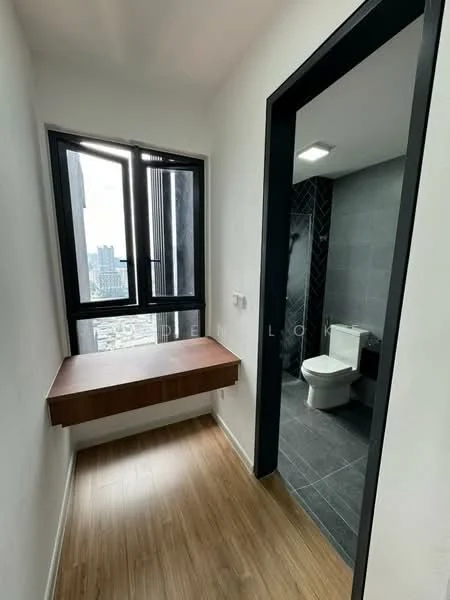Room features: large window with black frame, wooden wall-mounted desk, light wood flooring, grey tiled flooring, white painted walls, black accent wall, toilet, modern light fixture; style: modern; view: city.