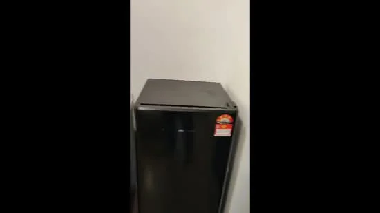 Room features: black fridge.