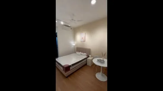 Bedroom features: queen-size bed, upholstered headboard, 2 bedside tables, table lamp, ceiling fan, wall-mounted air conditioning unit, wooden flooring, decorative artwork on wall, neutral painted walls, window with curtain; style: modern.