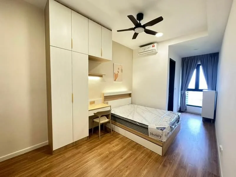 Bedroom features: wooden flooring, white painted walls, ceiling fan with light, built-in wardrobe with white finish, study desk with chair, single bed frame, window with curtain, air conditioning unit, light fixture, door to balcony; style: modern; view: city.