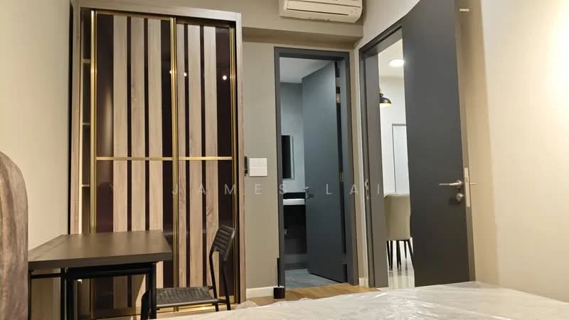 Room features: wood paneling with gold accents, grey painted walls, wooden flooring, air conditioning unit, modern door design, table with chair, plastic covering on surface, open doorway leading to another room; style: modern.