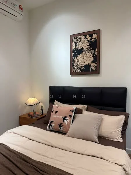 Bedroom features: king-size bed with upholstered headboard, decorative throw pillows, bedside lamp, wooden nightstand, framed artwork on wall, white painted walls, air conditioning unit, bed linens in neutral tones; style: modern.