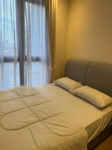Bedroom features: queen-size bed, upholstered headboard, light-colored bedding, floor-to-ceiling windows, sheer curtains, wooden flooring, neutral wall color, decorative wall paneling; style: modern; view: city.