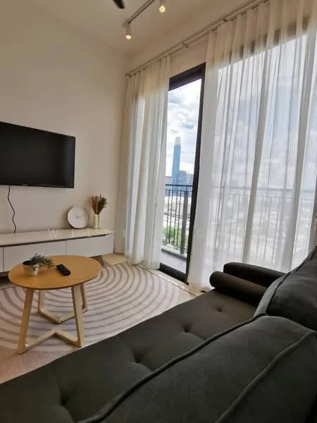 Living features: grey fabric sofa, round wooden coffee table, wall-mounted TV, white TV console, floor-to-ceiling windows, sheer curtains, area rug with circular pattern, decorative plant in ceramic pot, recessed ceiling lights; style: modern; view: city.