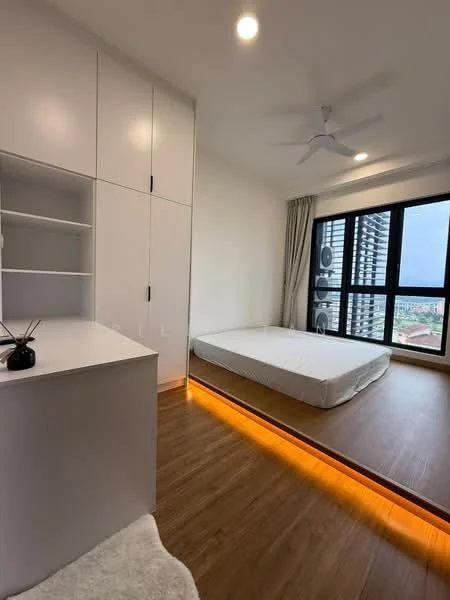 Bedroom features: wooden flooring, white painted walls, built-in wardrobe with sliding doors, ceiling fan, floor-to-ceiling windows, curtains, LED strip lighting under bed platform, unmade bed with mattress; style: modern; view: city.