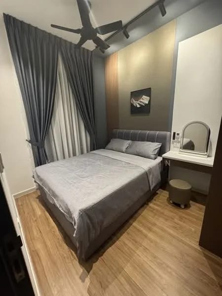 Bedroom features: queen-size bed with grey bedding, upholstered headboard, wooden flooring, 5-blade ceiling fan, floor-to-ceiling curtains in grey, decorative wall art, built-in vanity with mirror, small round stool; style: modern.