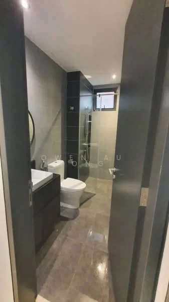 Bathroom features: grey tiled walls, grey tiled flooring, single-sink vanity with dark cabinetry, round mirror, one-piece toilet, walk-in shower with glass enclosure, chrome shower head, recessed downlights; style: modern.