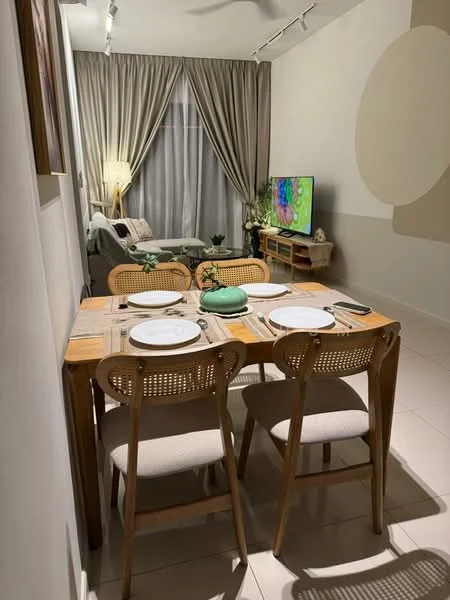 Dining features: wooden dining table, 4 dining chairs with upholstered seats, table setting with plates and utensils, decorative green centerpiece, light-colored flooring, wall-mounted TV, sofa in background, floor-to-ceiling curtains, indirect lighting from ceiling, decorative plants; style: modern. Living features: sofa, TV console, wall-mounted TV, decorative plants, floor-to-ceiling curtains, indirect lighting from ceiling; style: modern.