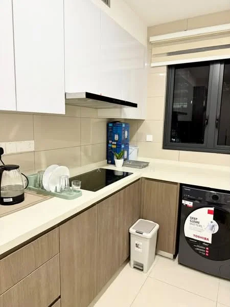 Kitchen features: white upper cabinets, wood lower cabinets, light-colored countertop, stainless-steel sink, chrome pull-down faucet, built-in stove with hood, black built-in oven, dishwasher, kitchen waste bin, glass window, roller blinds, decorative plant; style: modern.