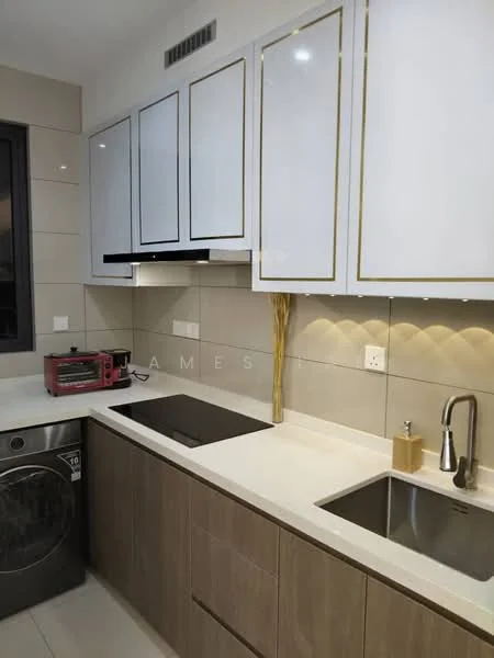 Kitchen features: white shaker cabinets with gold trim, light beige countertop, double-bowl stainless-steel sink, chrome pull-down faucet, built-in oven, toaster oven in pink, ceramic tile backsplash, washing machine, recessed LED downlights, wall-mounted cabinetry, dark window frame, neutral wall tiles; style: modern.