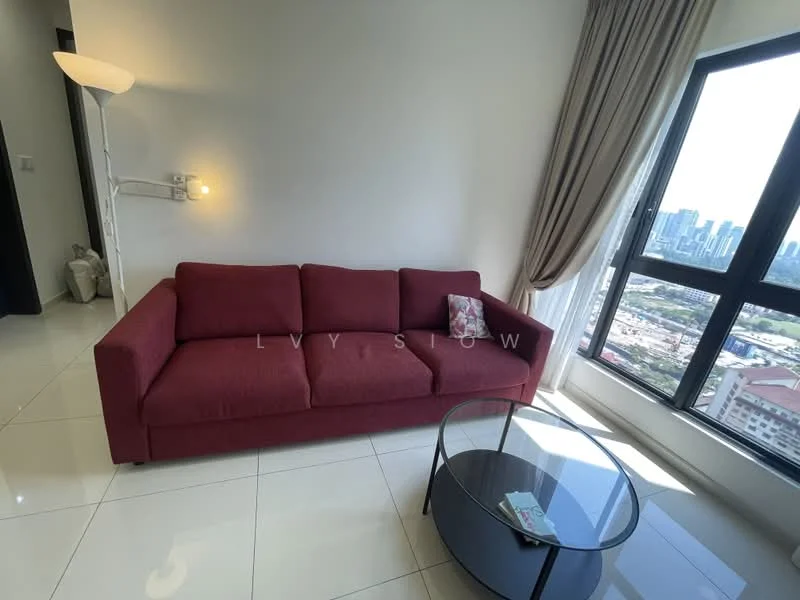 Living features: red fabric sofa, glass coffee table, floor-to-ceiling windows, city skyline view, white walls, glossy tile flooring, curtains, lamp, decorative items on table; style: modern; view: city.