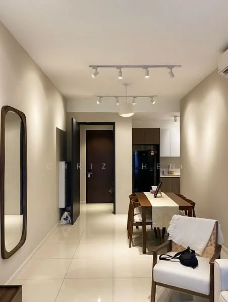 Room features: white painted walls, glossy tile flooring, track lighting, large wall mirror, wooden dining table, 4 wooden dining chairs, black refrigerator, kitchen cabinetry, air conditioning unit, door to hallway, decorative items on table; style: modern.