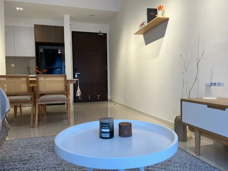 Living features: grey wall, white painted walls, ceramic tile flooring, wooden coffee table, round white tray on coffee table, decorative candles on coffee table, light wood sideboard, wall-mounted shelf, decorative branches in vase, open-plan layout with kitchen visible, dining area with wooden chairs, black fridge, door leading to hallway; style: modern.