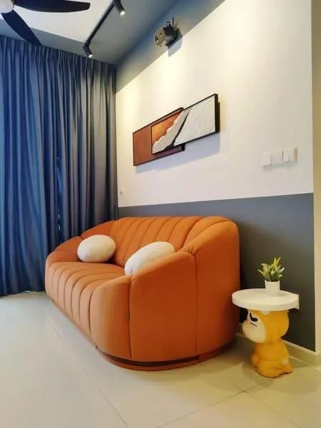 Living features: orange curved sofa with tufted design, two white round cushions, white side table, decorative plant on side table, blue curtains, white painted walls, grey accent wall, ceiling fan, artwork on wall; style: modern.